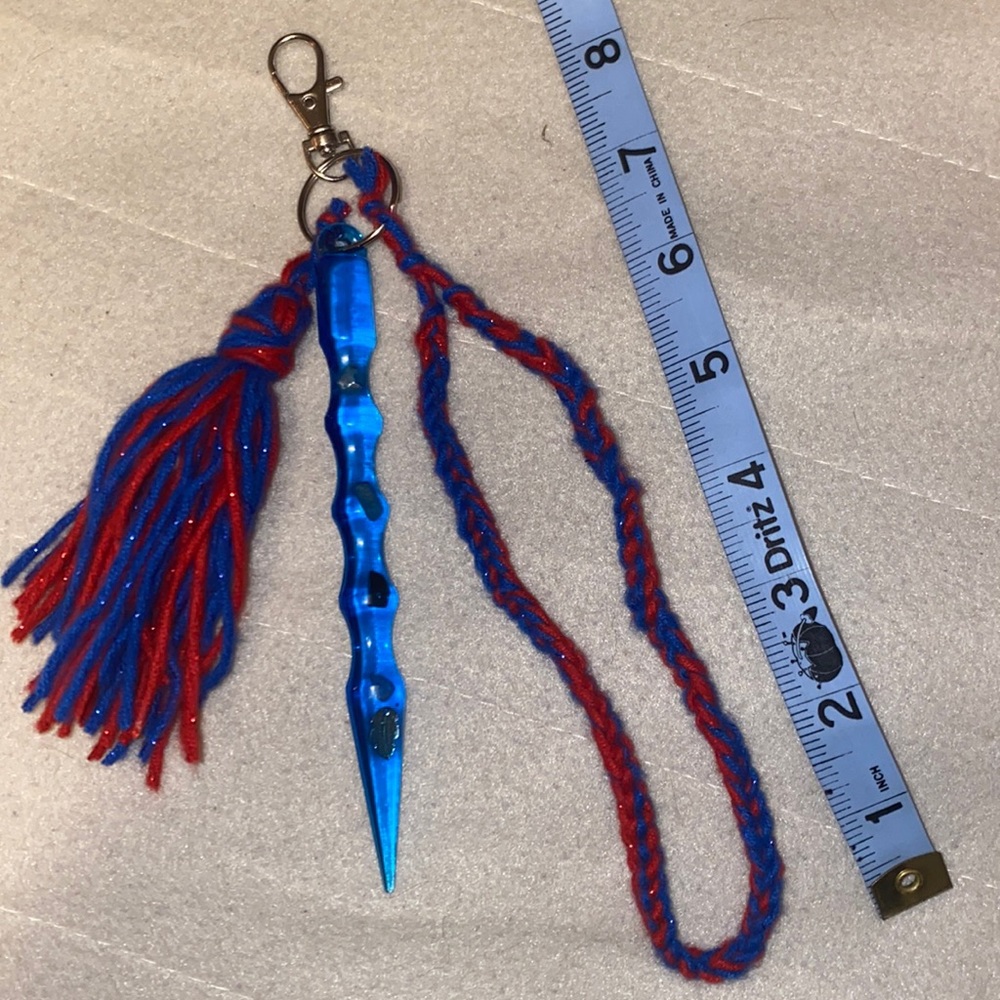 Blue with red accents resin Self-defense keychains with stones/ feather inside